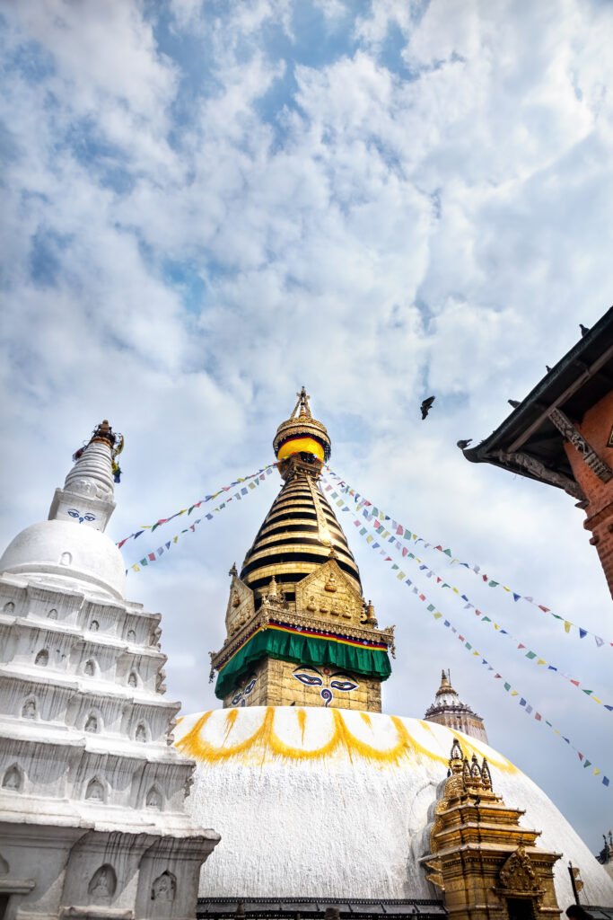Swayambhunath stupa at blue cloudy sky in Kathmandu, Nepal